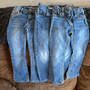 Wallflower Girl jeans. Worn but still lots of life left. All size 5.